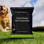 dog with a bag of soil improver